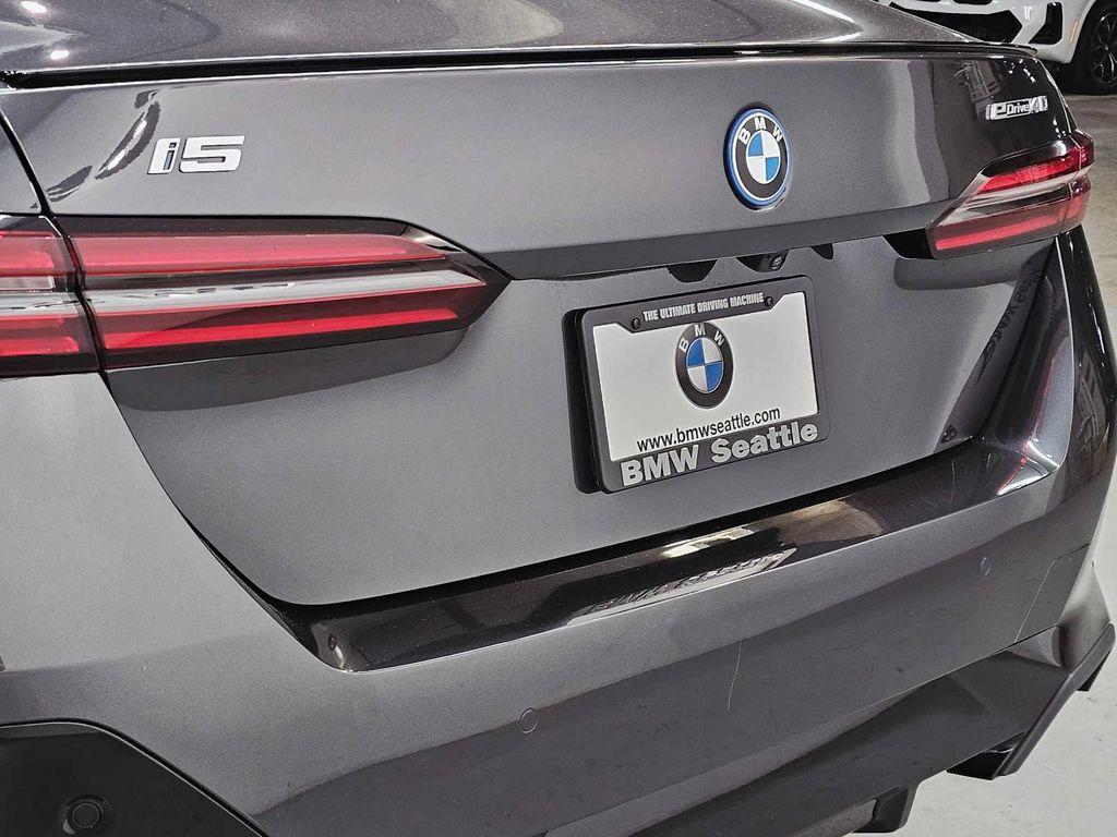used 2024 BMW i5 car, priced at $49,999