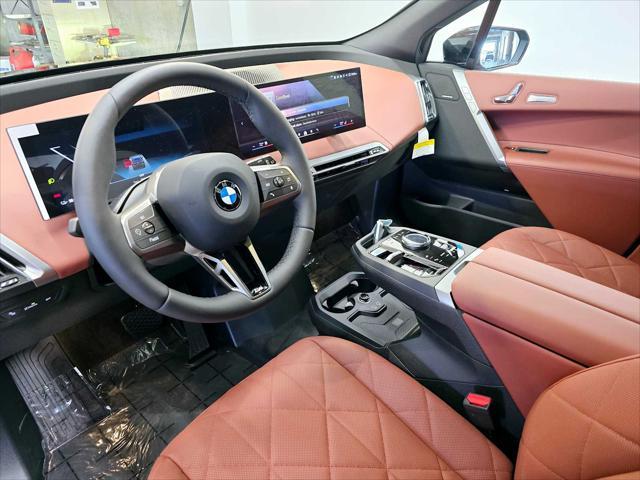 new 2025 BMW iX car, priced at $102,230