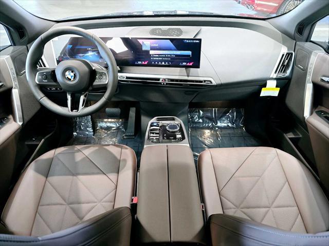 new 2025 BMW iX car, priced at $99,880