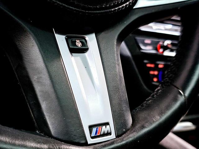 used 2022 BMW M550 car, priced at $61,888