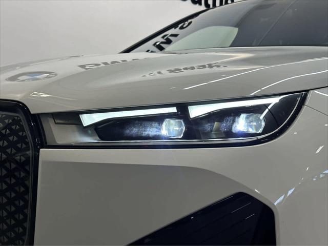 new 2024 BMW iX car, priced at $98,695