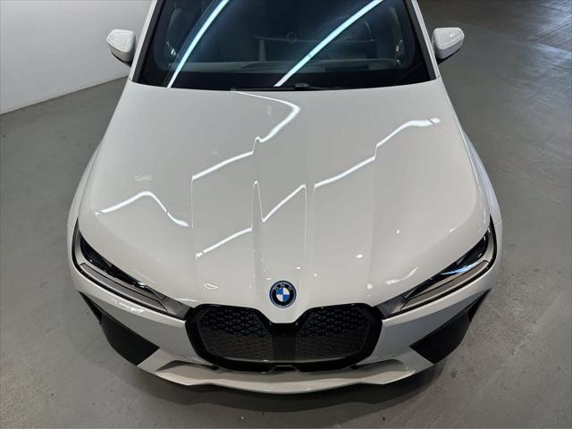 new 2024 BMW iX car, priced at $98,695