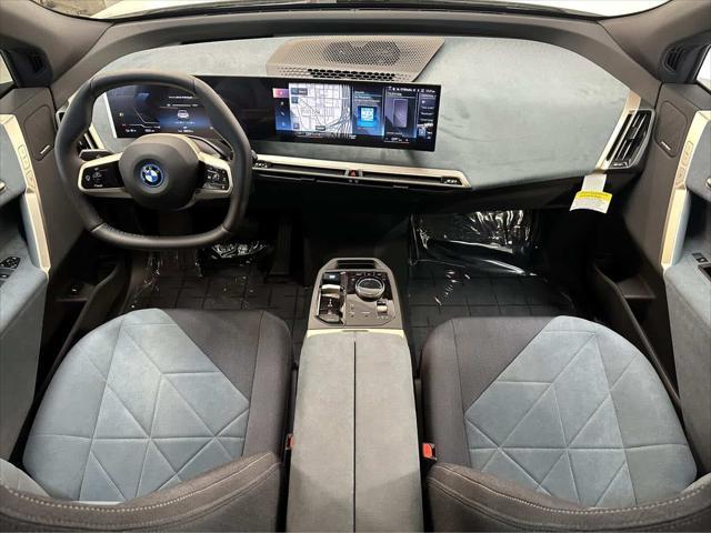 new 2024 BMW iX car, priced at $98,695