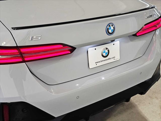 used 2024 BMW i5 car, priced at $54,999
