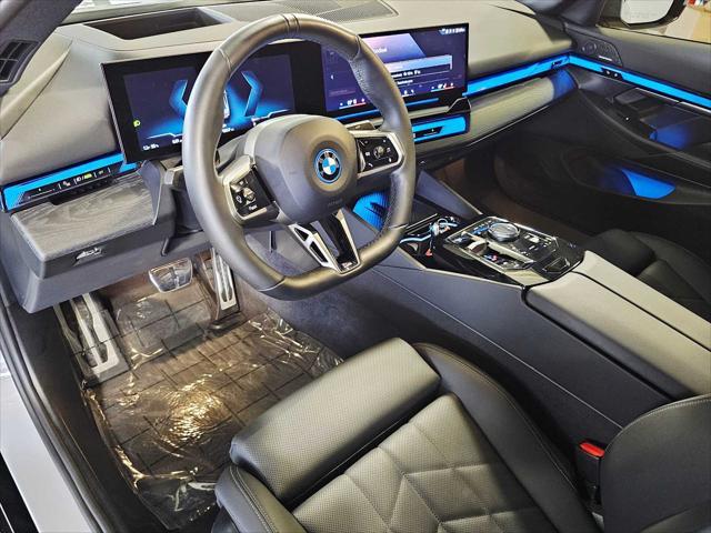 used 2024 BMW i5 car, priced at $54,999