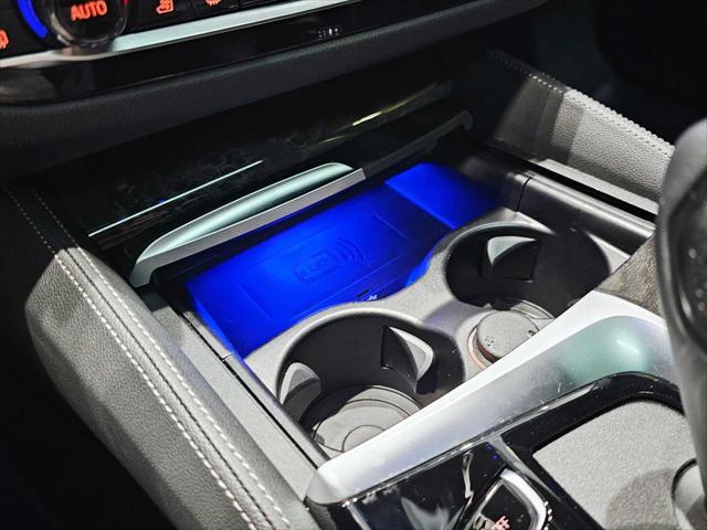 used 2023 BMW M550 car, priced at $71,888
