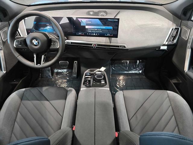 new 2026 BMW iX car, priced at $106,824