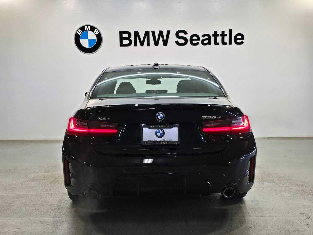 used 2023 BMW 330e car, priced at $37,888