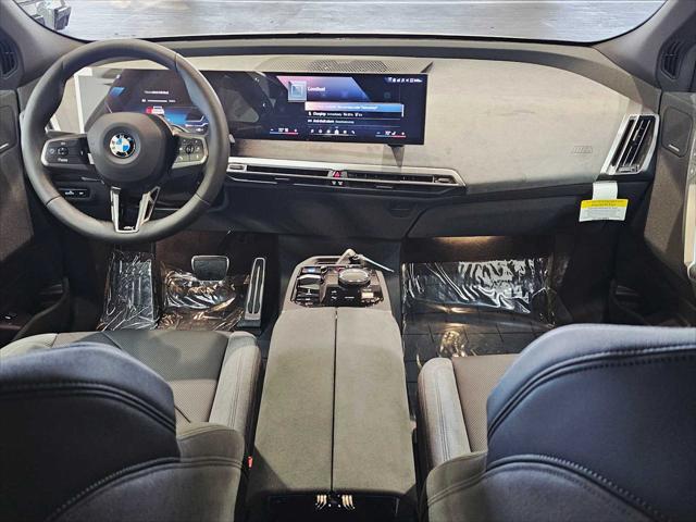 new 2026 BMW iX car, priced at $87,073