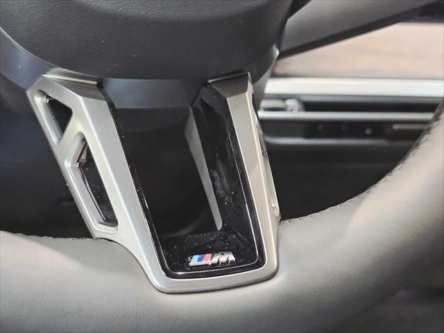 new 2026 BMW iX car, priced at $87,073
