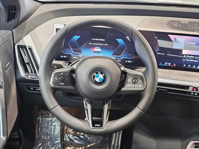 new 2026 BMW iX car, priced at $87,073