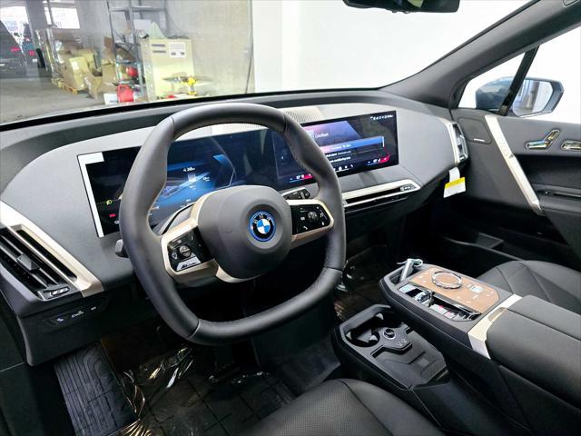 new 2025 BMW iX car, priced at $102,875