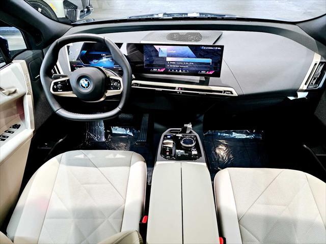 new 2025 BMW iX car, priced at $97,280