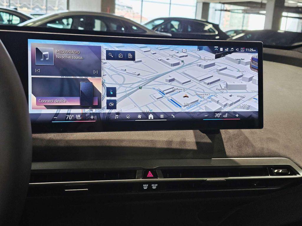 new 2026 BMW iX car, priced at $100,744