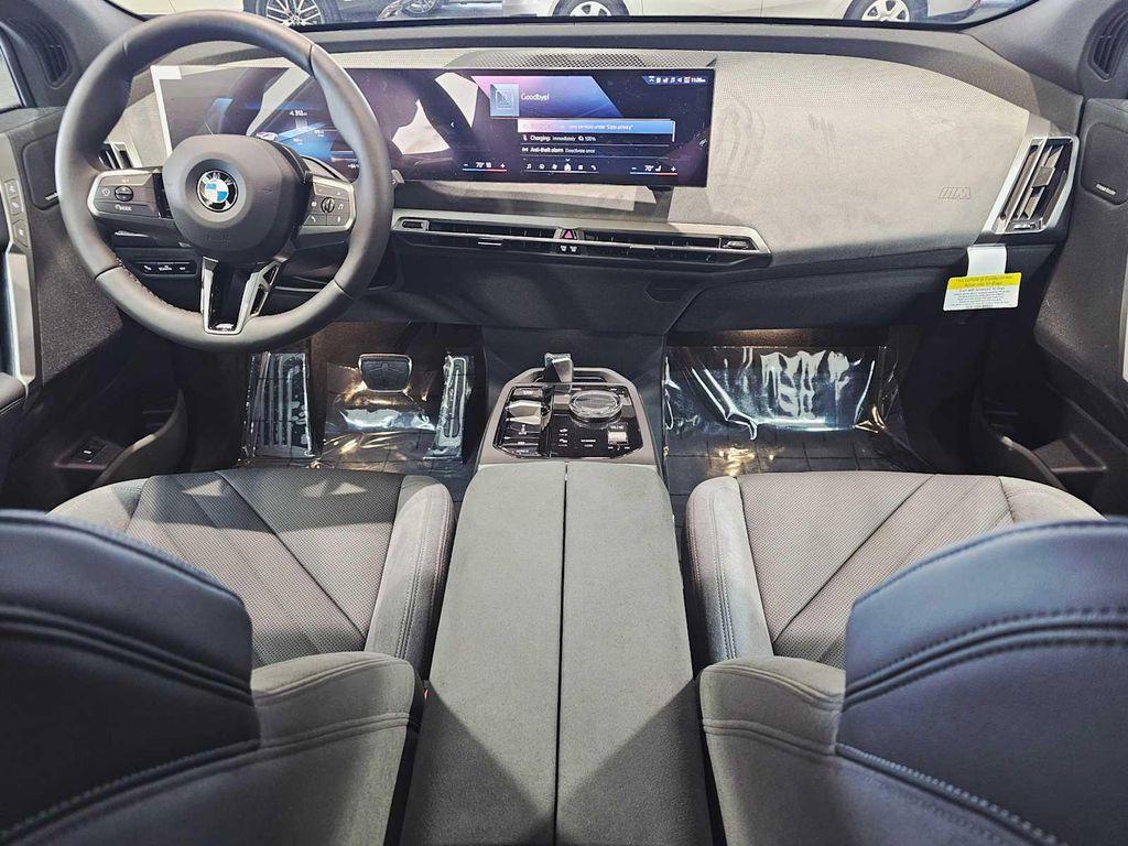 new 2026 BMW iX car, priced at $100,744