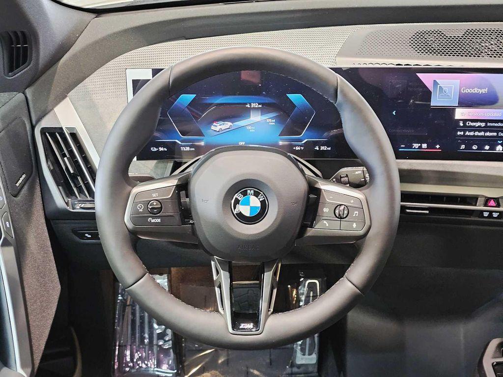 new 2026 BMW iX car, priced at $100,744