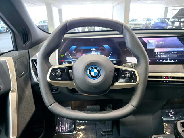 new 2025 BMW iX car, priced at $101,230