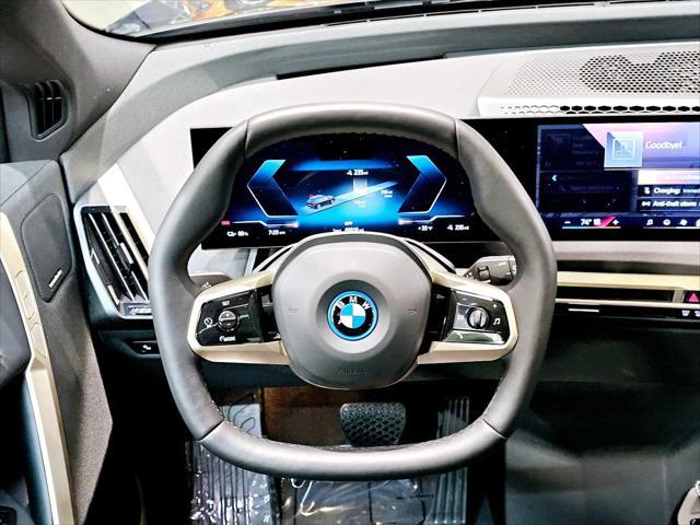 new 2025 BMW iX car, priced at $97,280