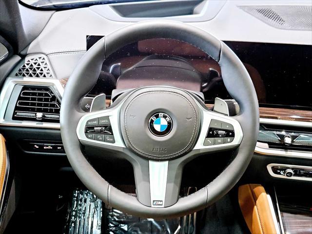 new 2025 BMW X6 car, priced at $83,885