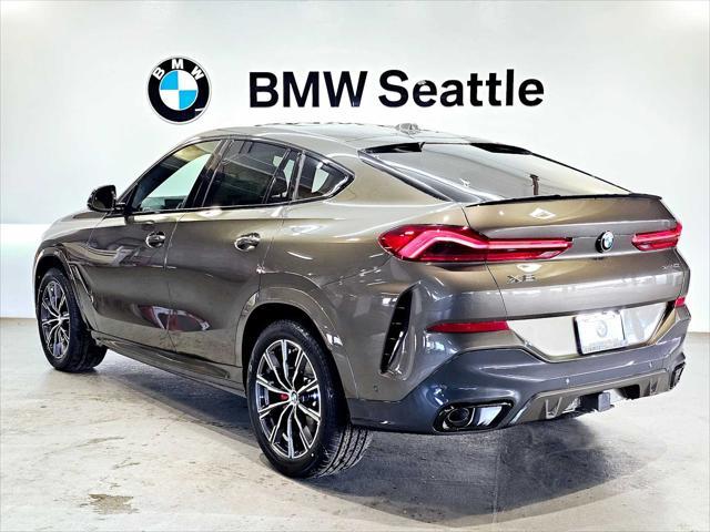 new 2025 BMW X6 car, priced at $83,885