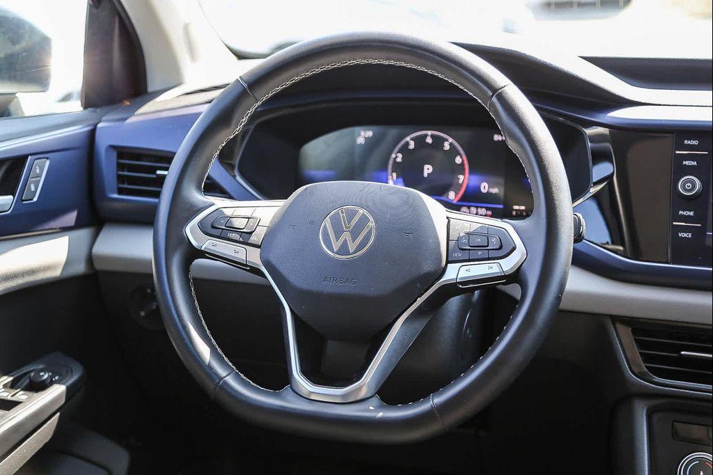 used 2022 Volkswagen Taos car, priced at $18,303