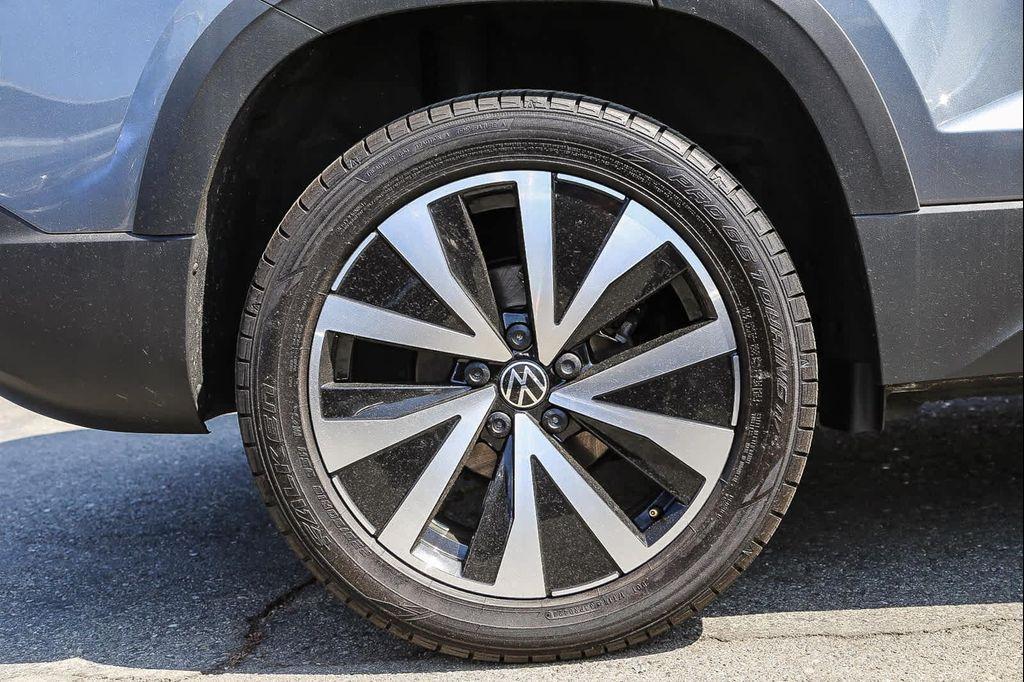 used 2022 Volkswagen Taos car, priced at $18,303