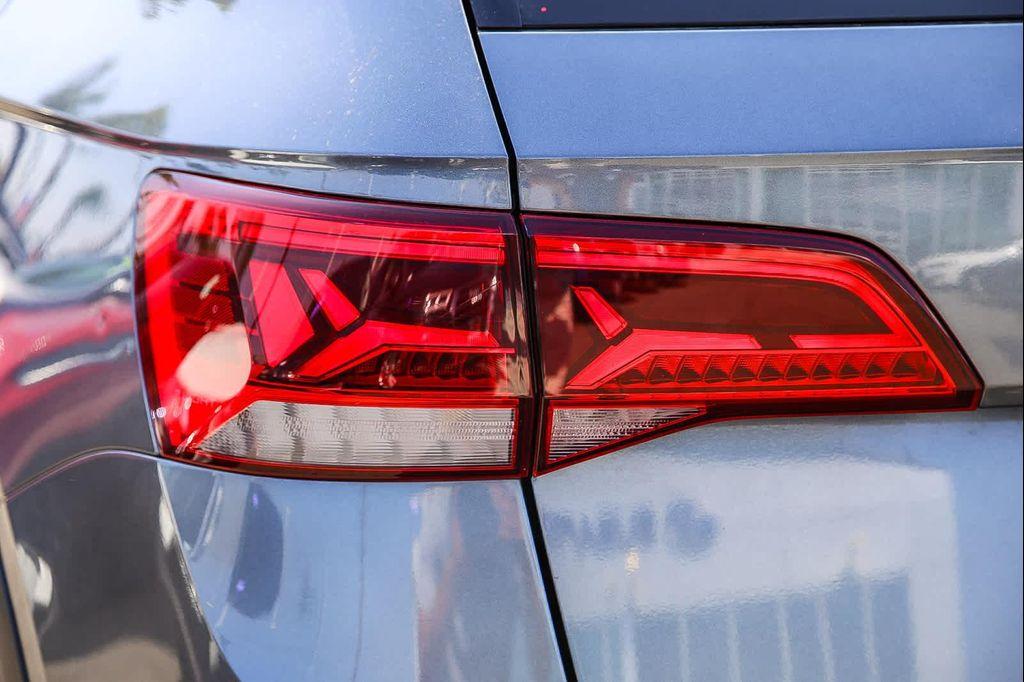 used 2022 Volkswagen Taos car, priced at $18,303