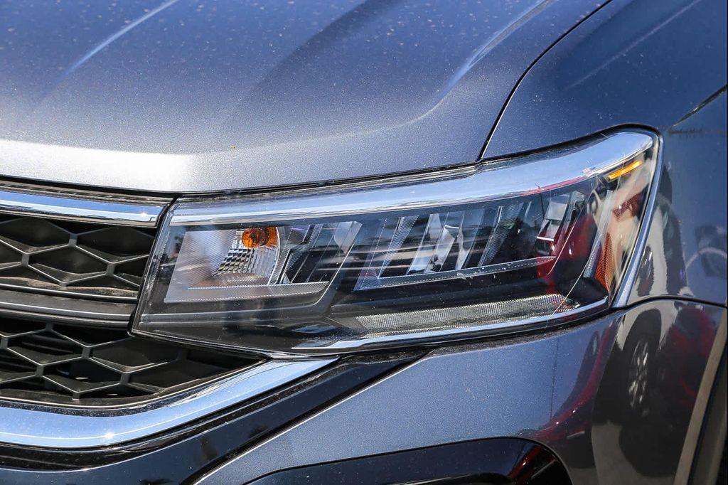 used 2022 Volkswagen Taos car, priced at $18,303