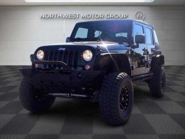 used 2015 Jeep Wrangler Unlimited car, priced at $16,999
