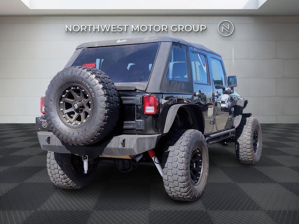 used 2015 Jeep Wrangler Unlimited car, priced at $14,999