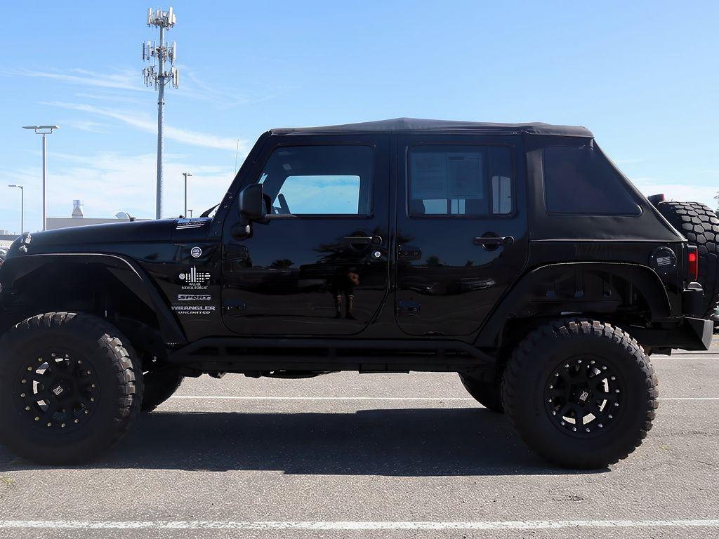 used 2015 Jeep Wrangler Unlimited car, priced at $14,999