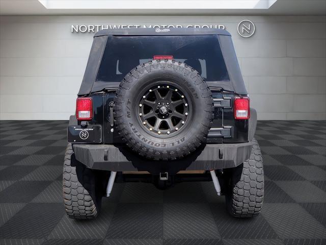 used 2015 Jeep Wrangler Unlimited car, priced at $16,999