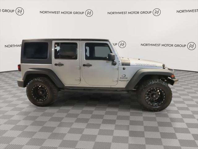 used 2015 Jeep Wrangler Unlimited car, priced at $18,385