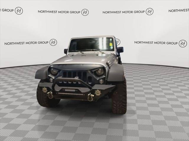 used 2015 Jeep Wrangler Unlimited car, priced at $18,385