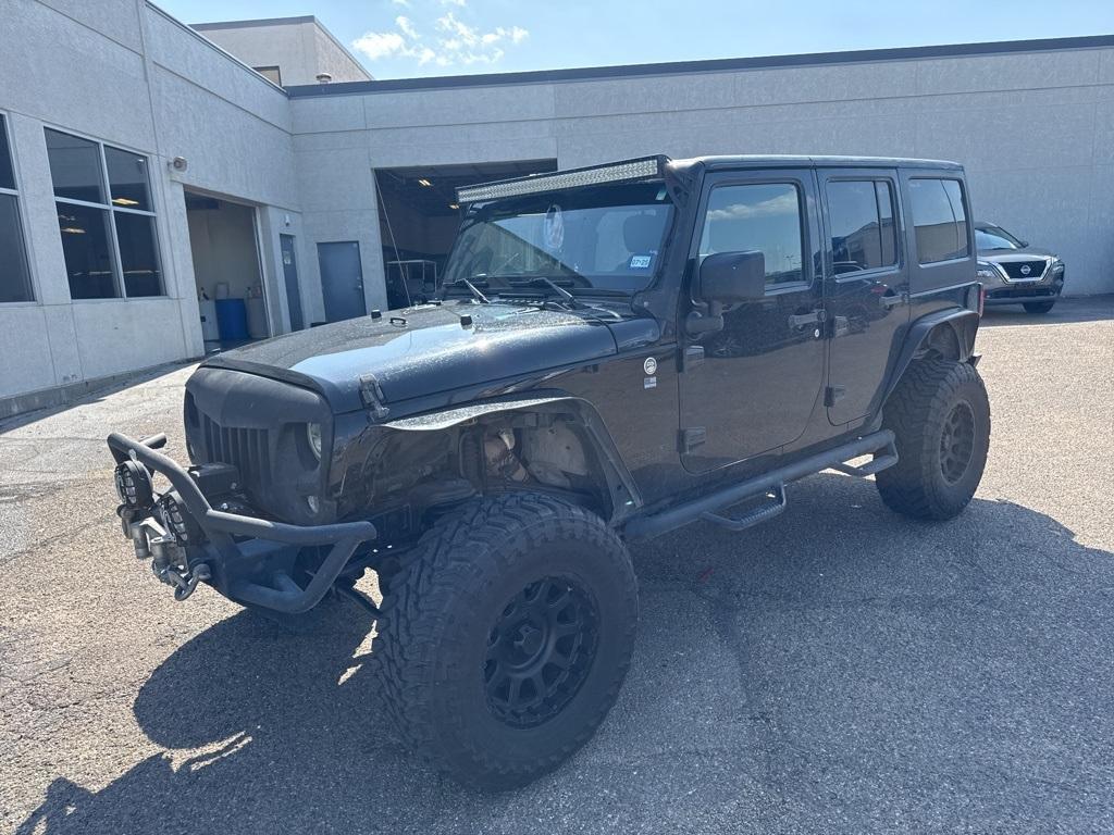 used 2014 Jeep Wrangler Unlimited car, priced at $17,316