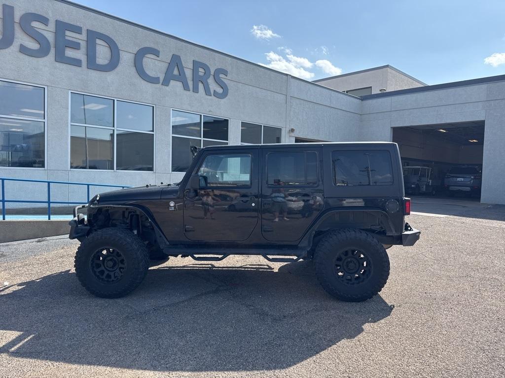 used 2014 Jeep Wrangler Unlimited car, priced at $17,316