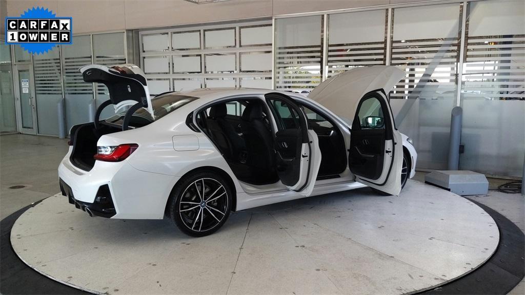 used 2023 BMW 330e car, priced at $30,000