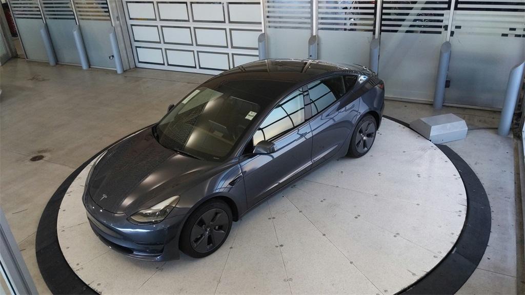 used 2023 Tesla Model 3 car, priced at $25,689