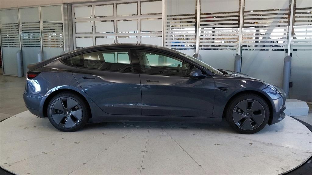 used 2023 Tesla Model 3 car, priced at $25,689