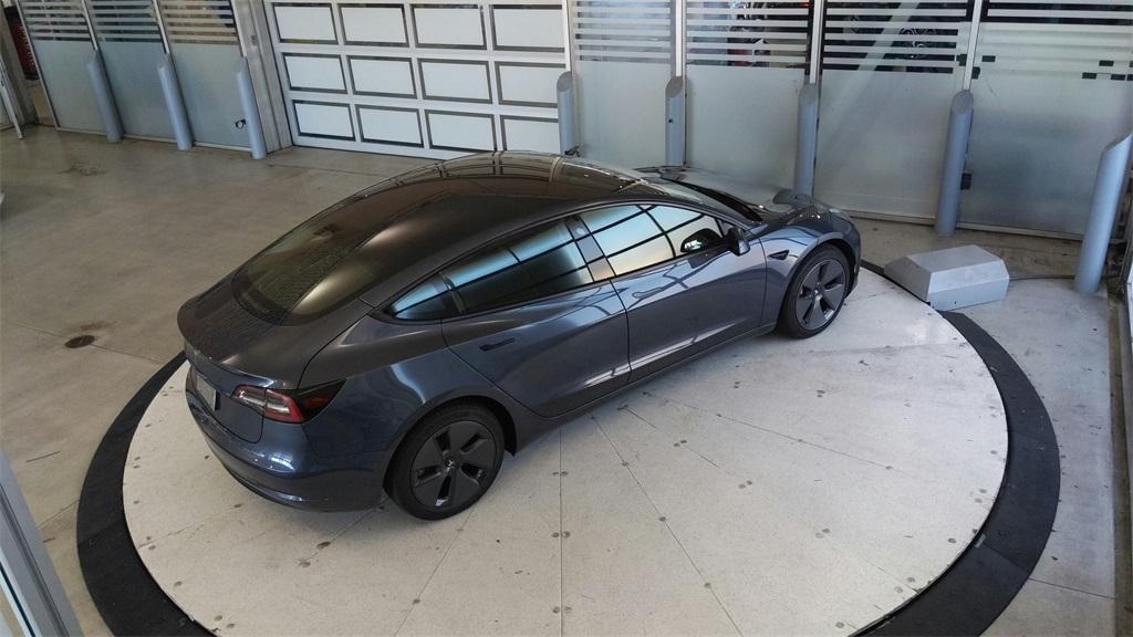 used 2023 Tesla Model 3 car, priced at $25,689