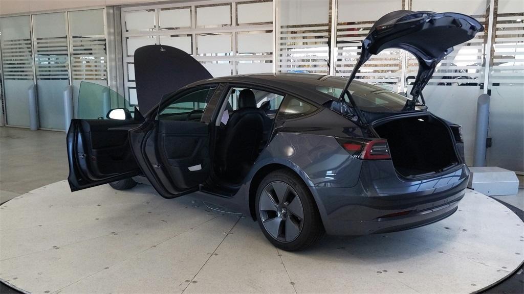 used 2023 Tesla Model 3 car, priced at $25,689