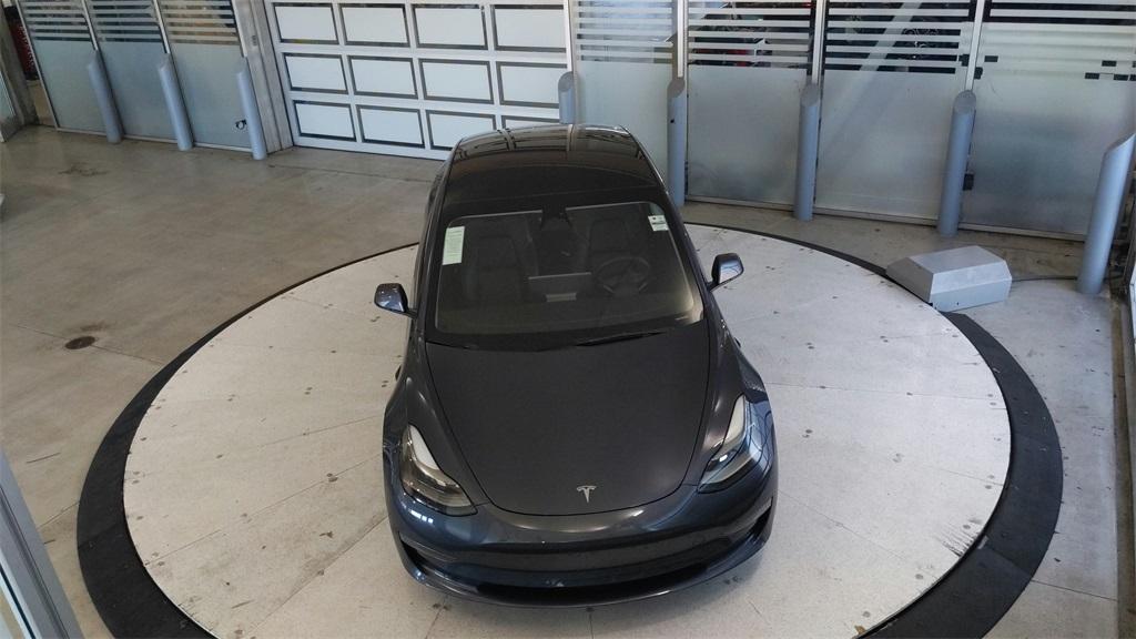 used 2023 Tesla Model 3 car, priced at $25,689