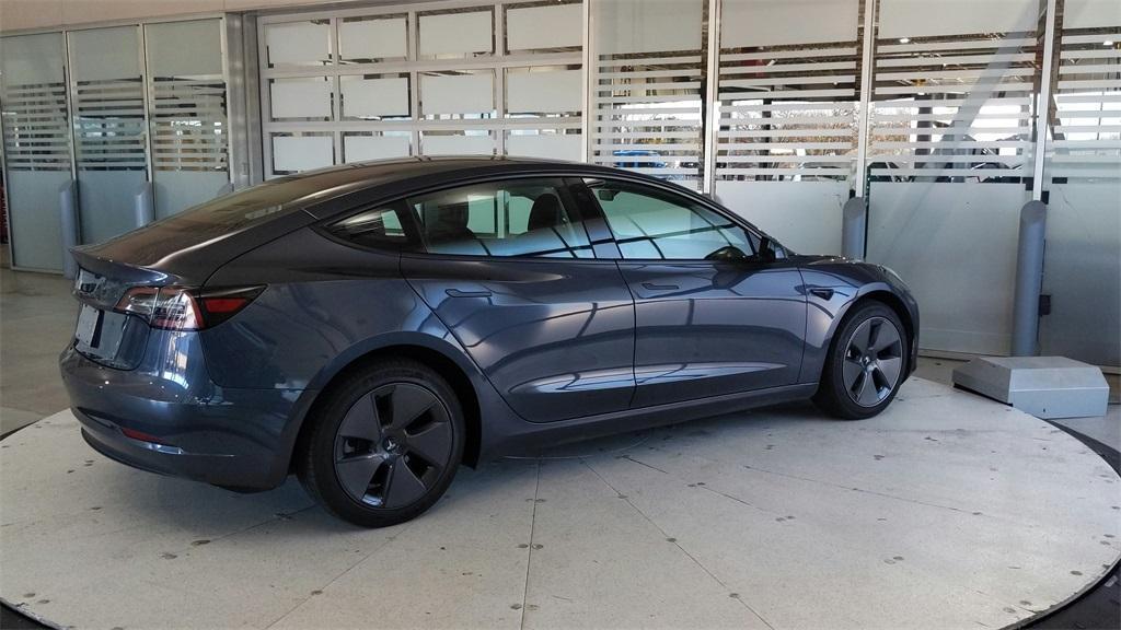 used 2023 Tesla Model 3 car, priced at $25,689