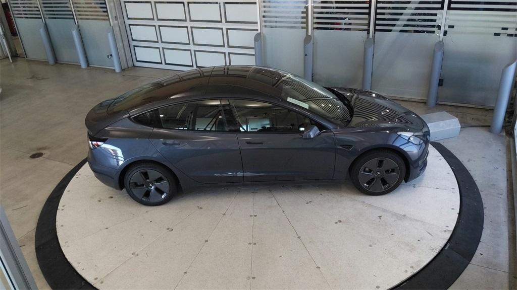 used 2023 Tesla Model 3 car, priced at $25,689