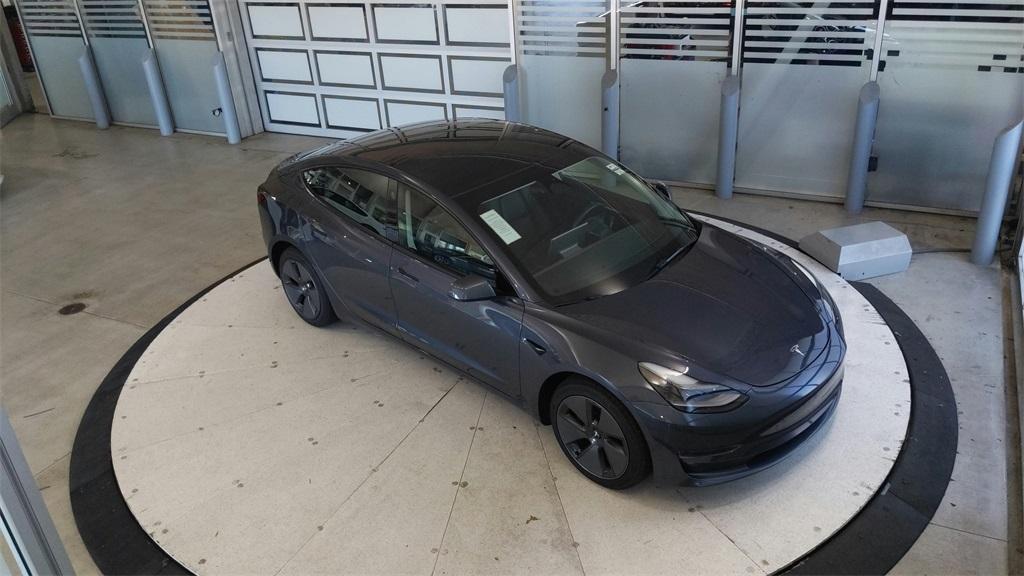 used 2023 Tesla Model 3 car, priced at $25,689