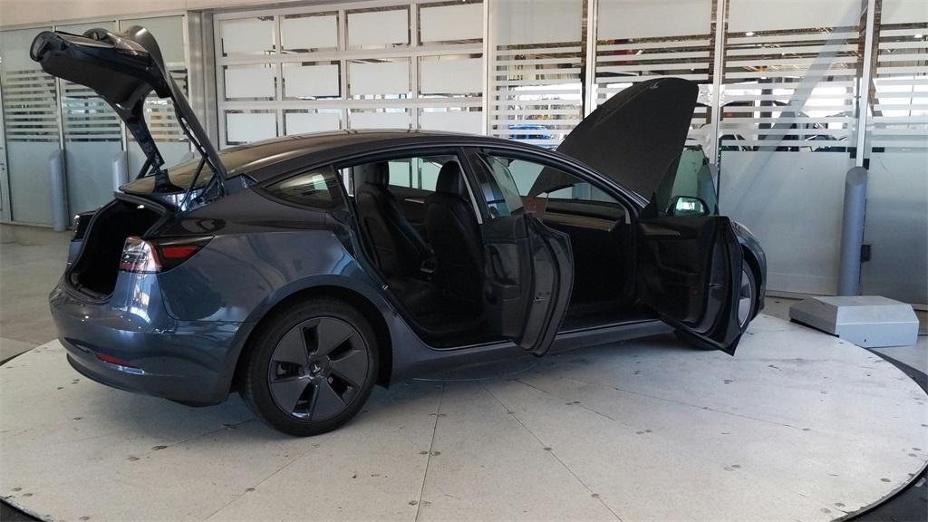 used 2023 Tesla Model 3 car, priced at $25,689