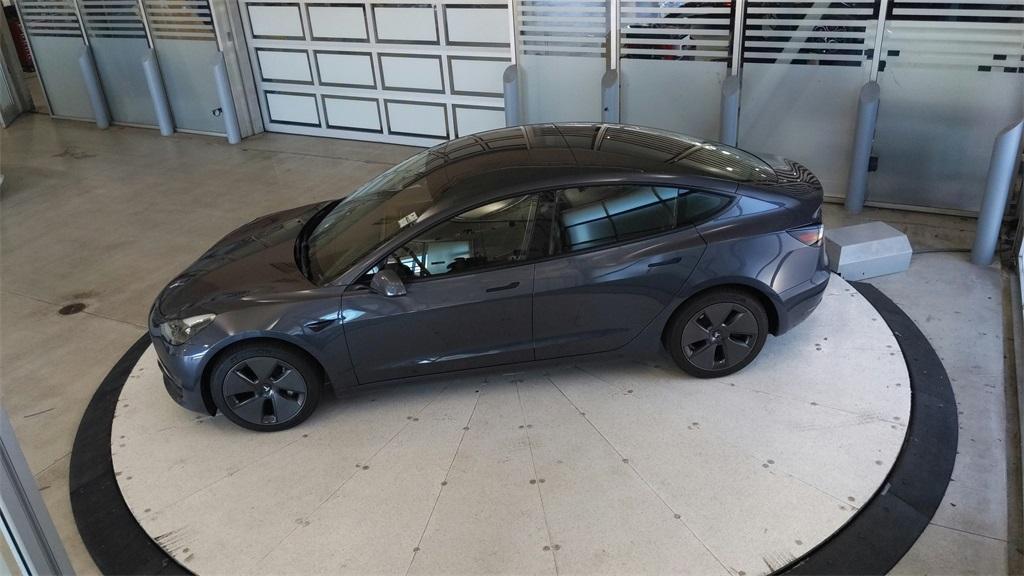 used 2023 Tesla Model 3 car, priced at $25,689