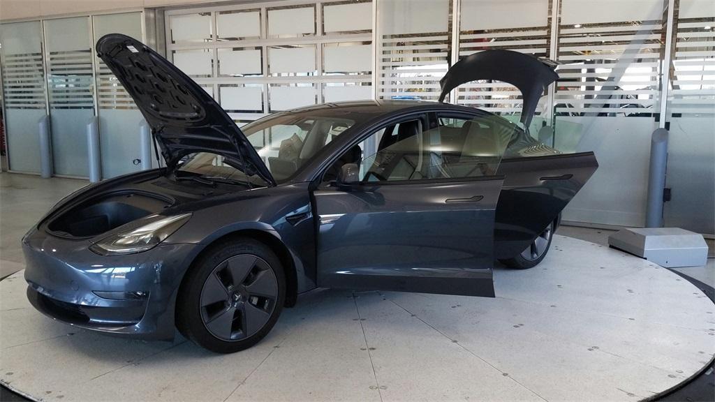 used 2023 Tesla Model 3 car, priced at $25,689