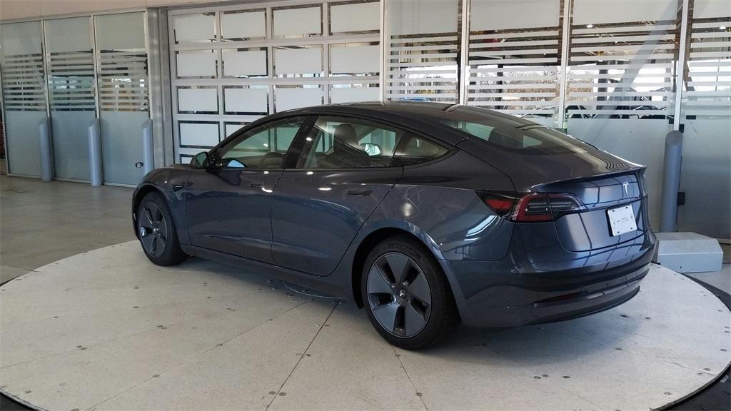 used 2023 Tesla Model 3 car, priced at $25,689