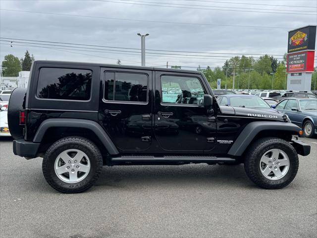 used 2011 Jeep Wrangler Unlimited car, priced at $23,995